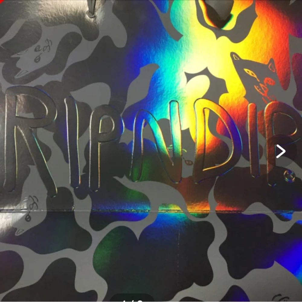 Ripndip LA Iridescent Camouflage Shopping Bag with White Ribbon Handles in EUC